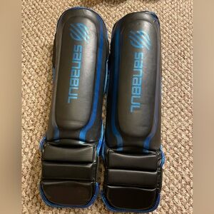 Sanabul Black and Blue Shin Guards